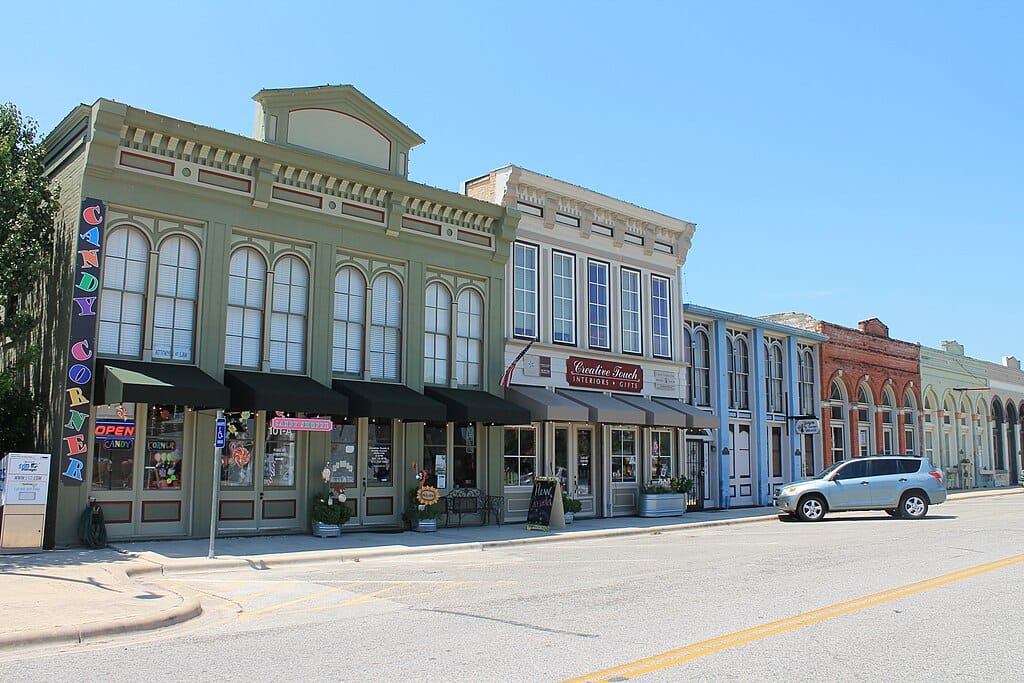Quaint town storefronts on sunny day